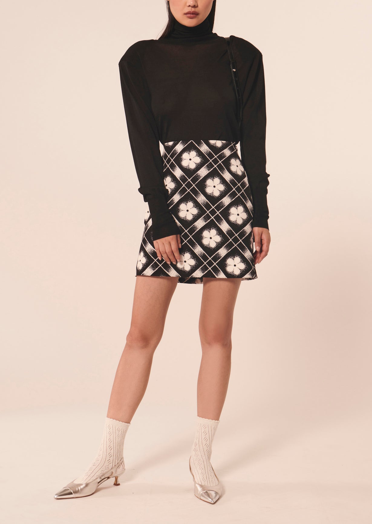 Jupe Jude noire imprimé à fleurs Faume - seconde main