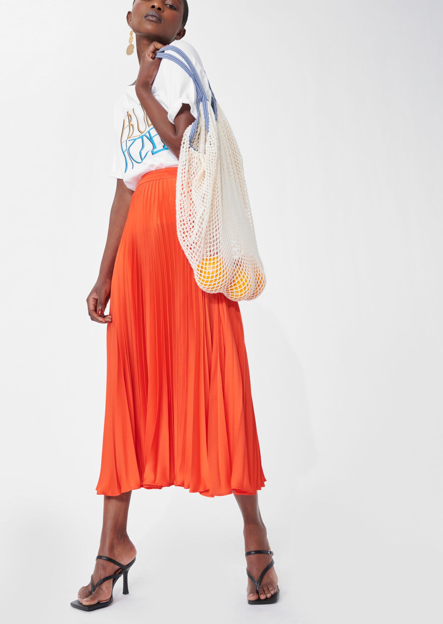 Jupe Juline orange en satin plissé Faume - seconde main