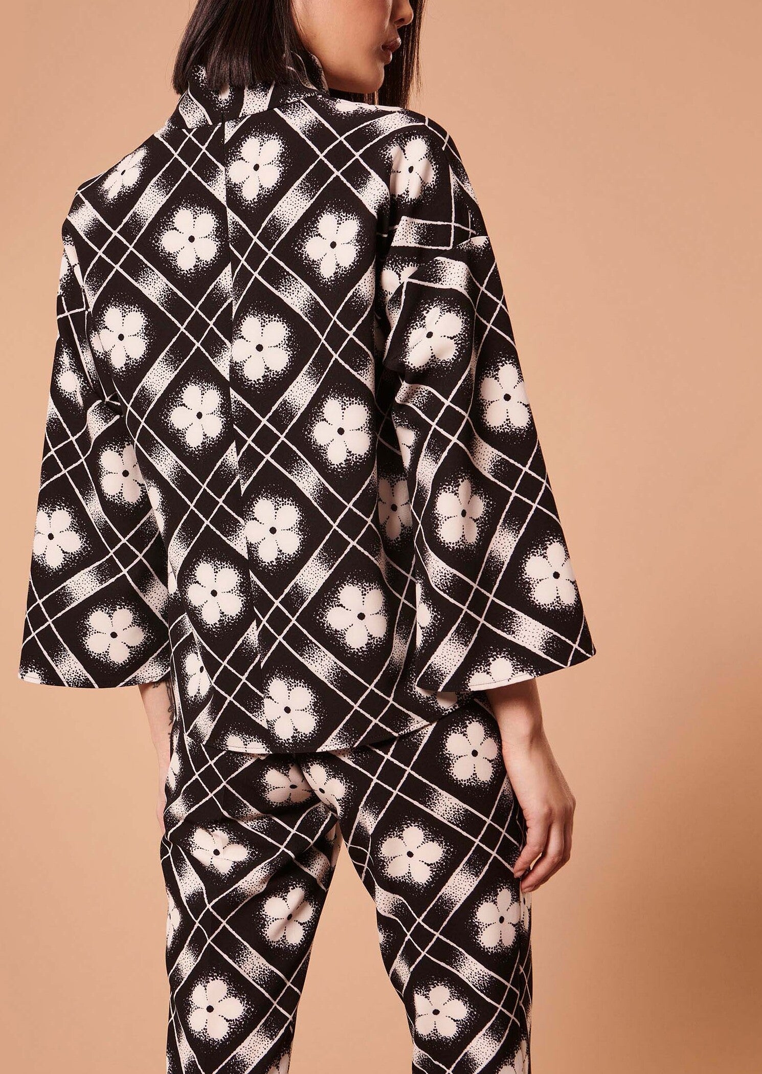 Top Tim noir imprimé à fleurs Faume - seconde main