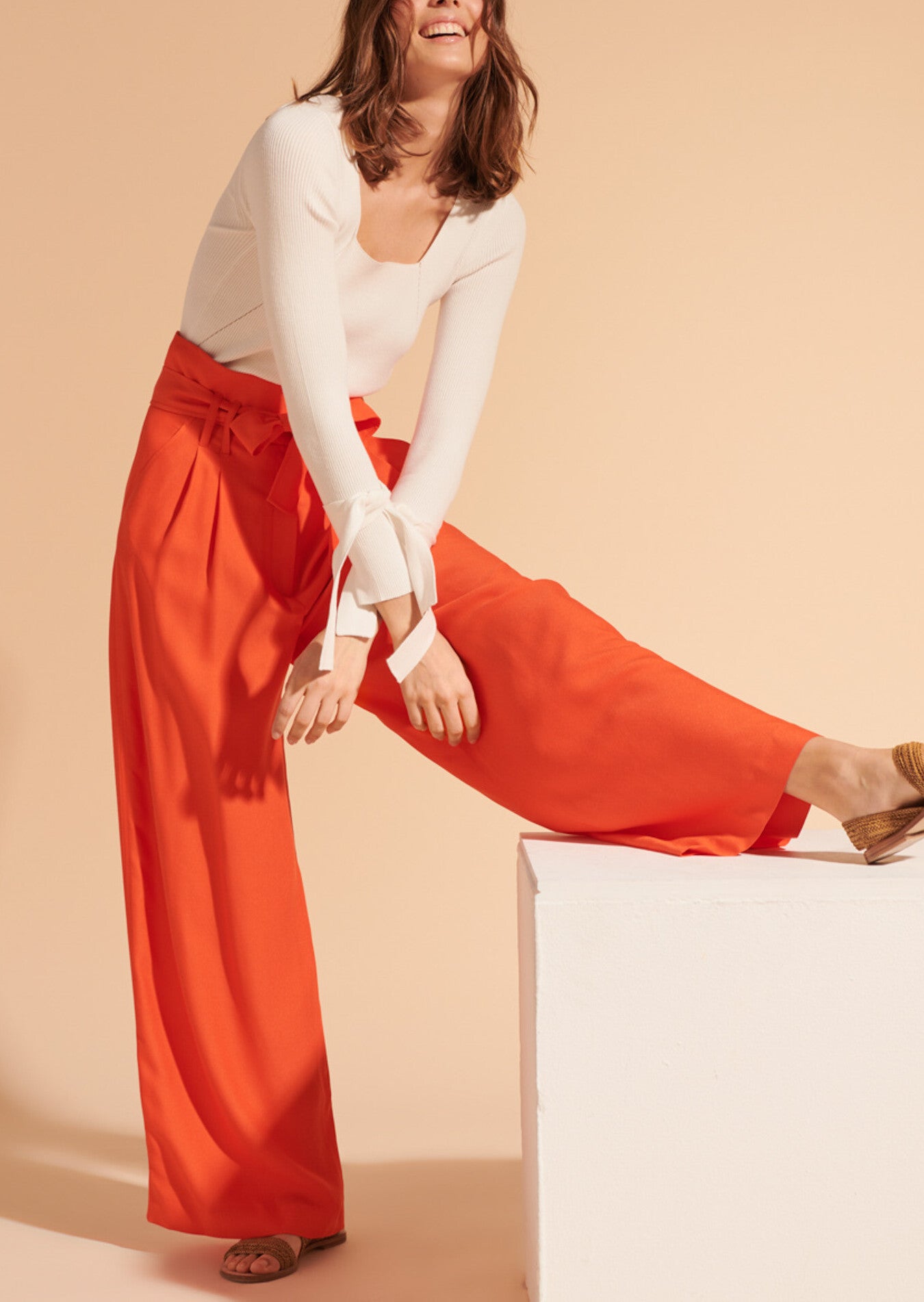 Pantalon Pia orange en crêpe léger Faume - seconde main