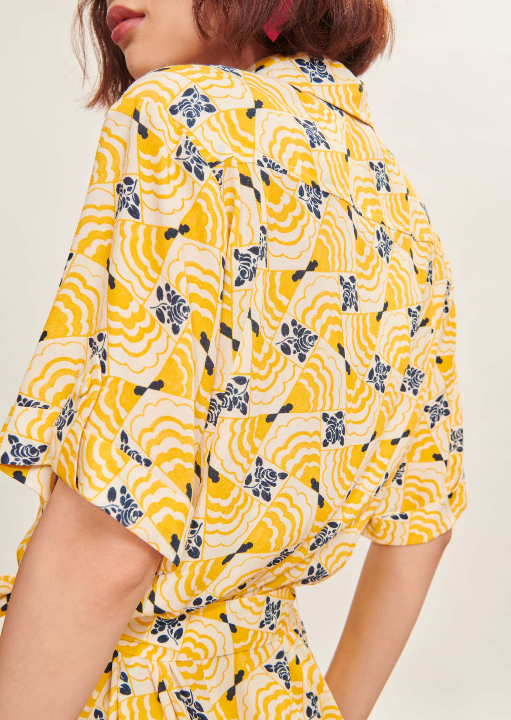 Combinaison Calypso jaune imprimé fleuri Faume - seconde main