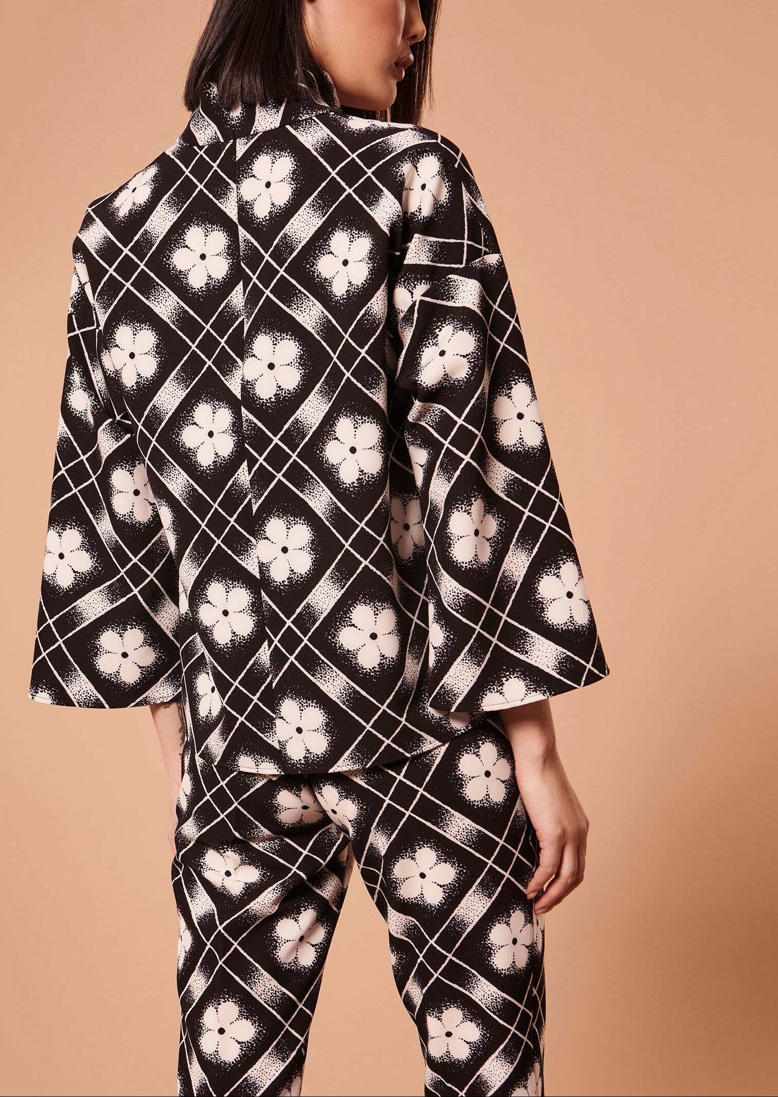 Top Tim noir imprimé à fleurs Faume - seconde main