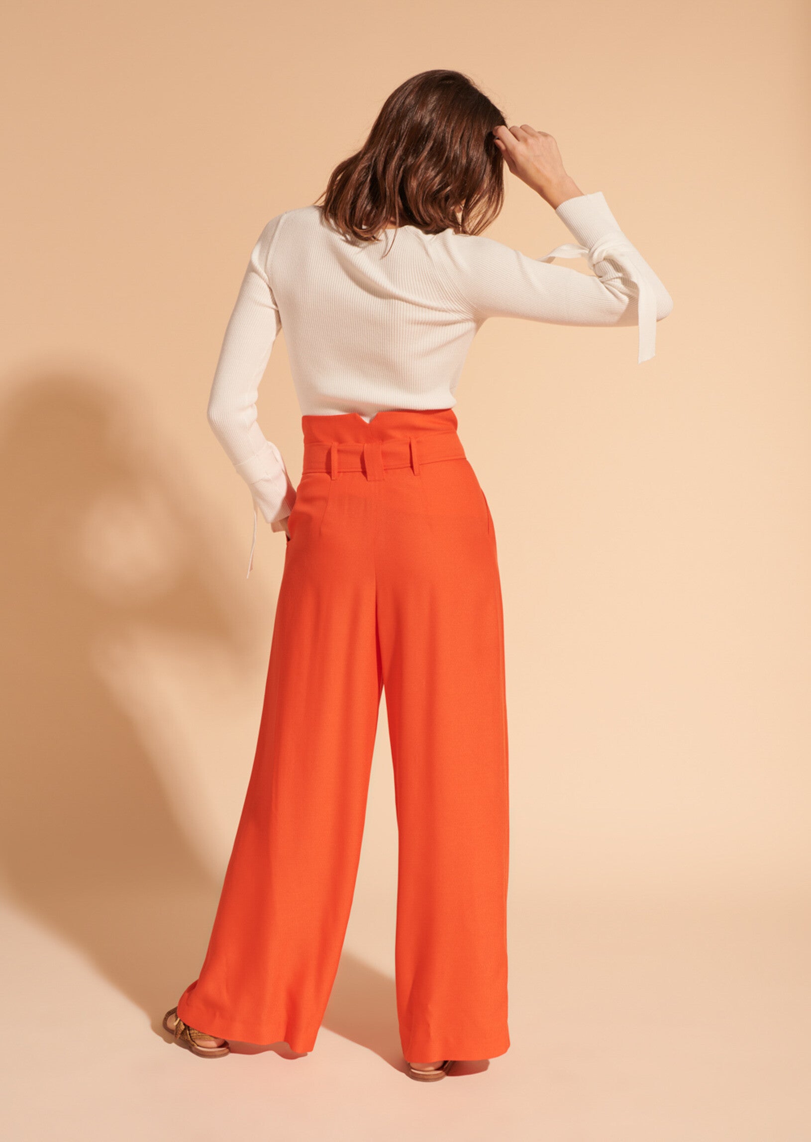 Pantalon Pia orange en crêpe léger Faume - seconde main