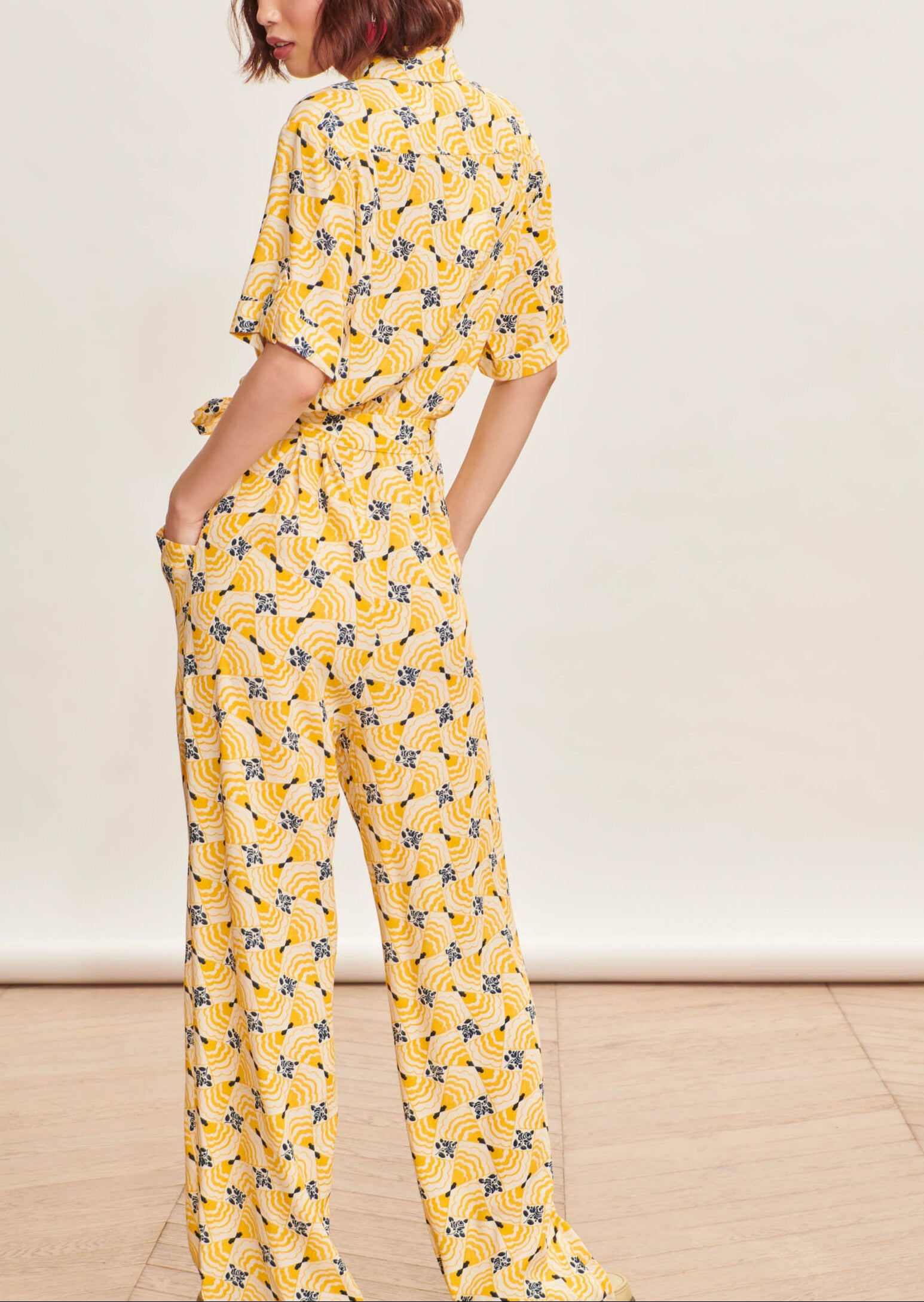 Combinaison Calypso jaune imprimé fleuri Faume - seconde main