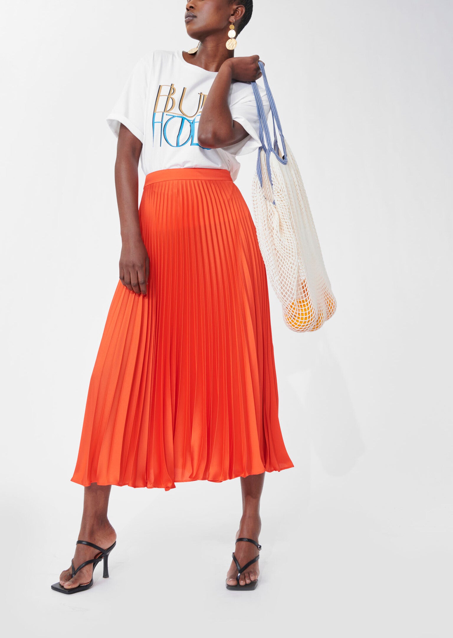 Jupe Juline orange en satin plissé Faume - seconde main