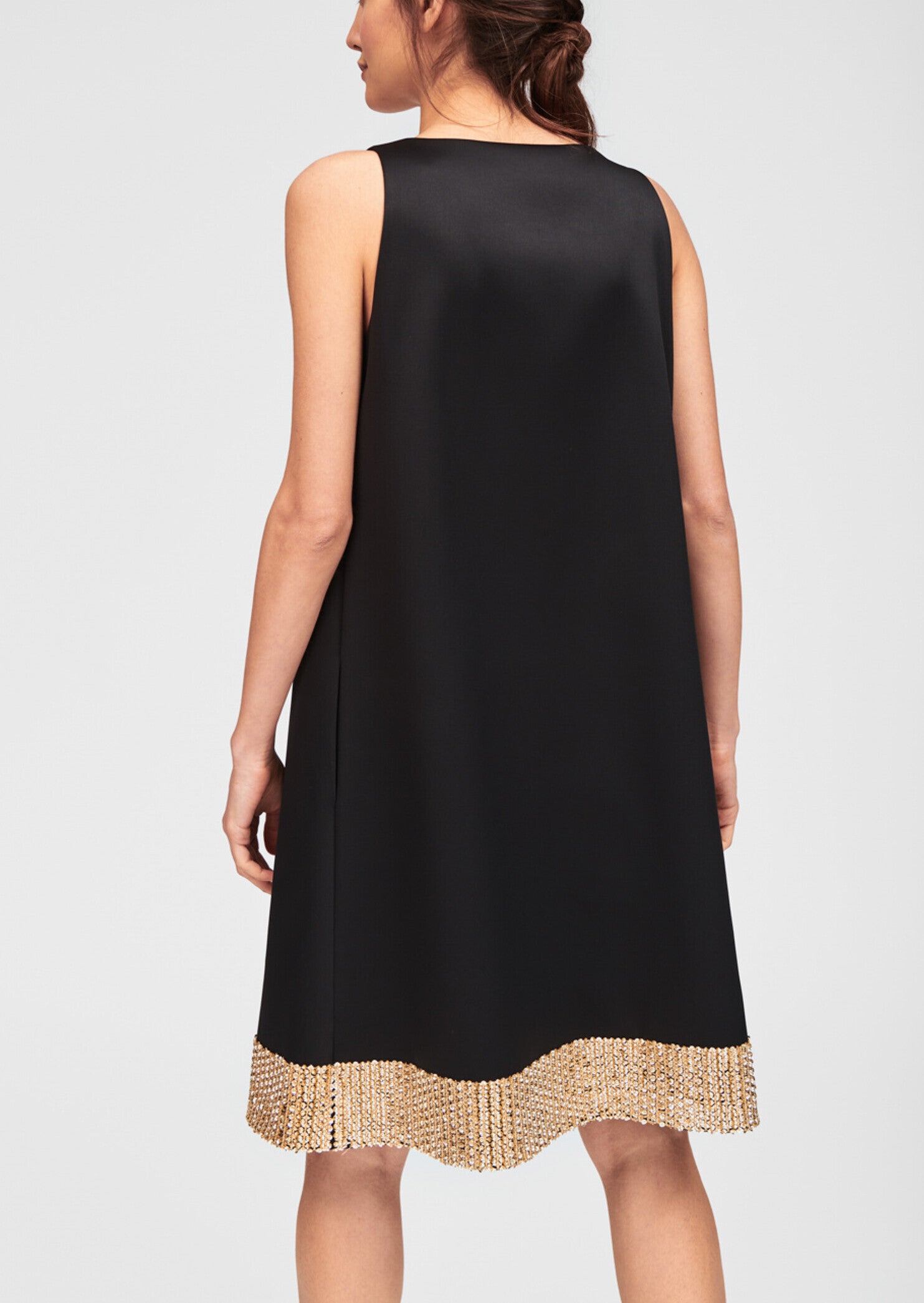 Robe noire évasée à sequins dorés Faume - seconde main