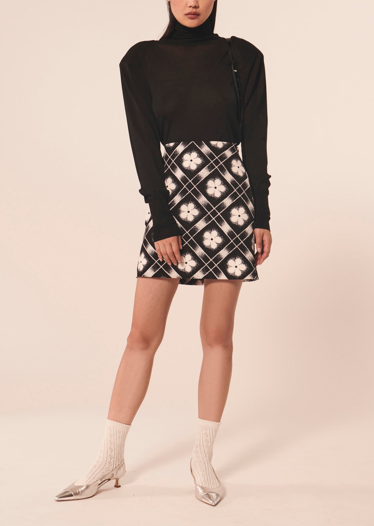 Jupe Jude noire imprimé à fleurs Faume - seconde main