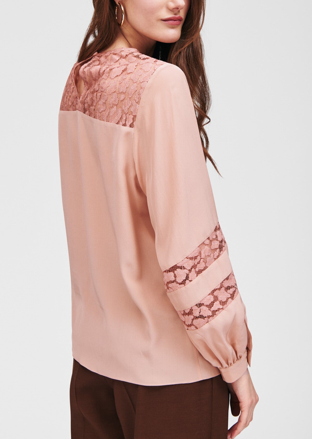 Top vieux rose en dentelle léopard à manches bouffantes Faume - seconde main