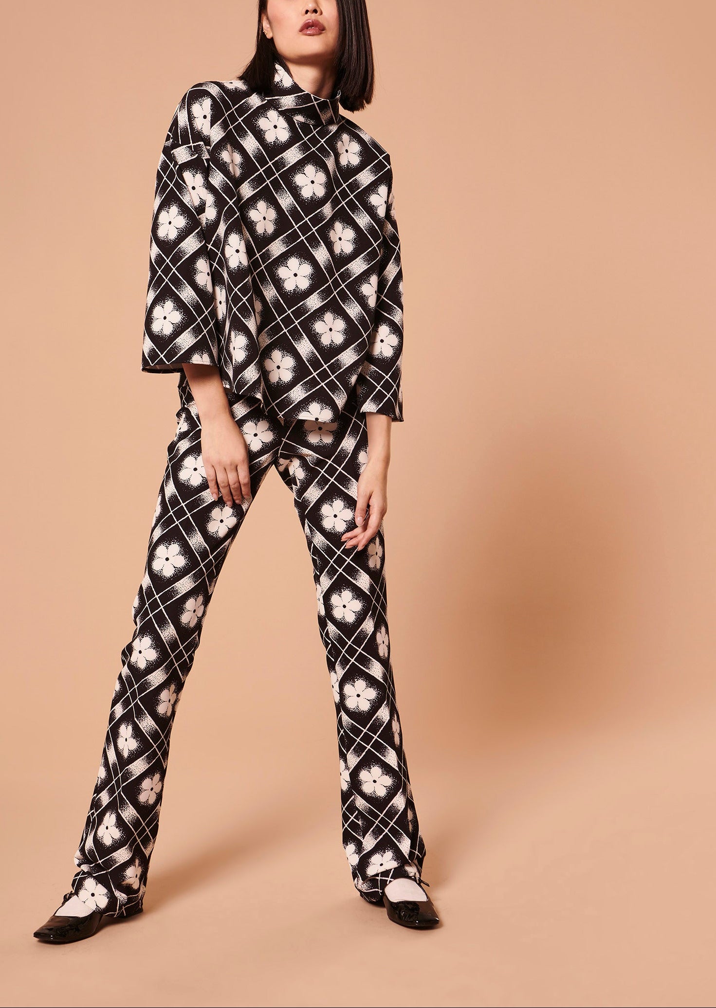 Top Tim noir imprimé à fleurs Faume - seconde main