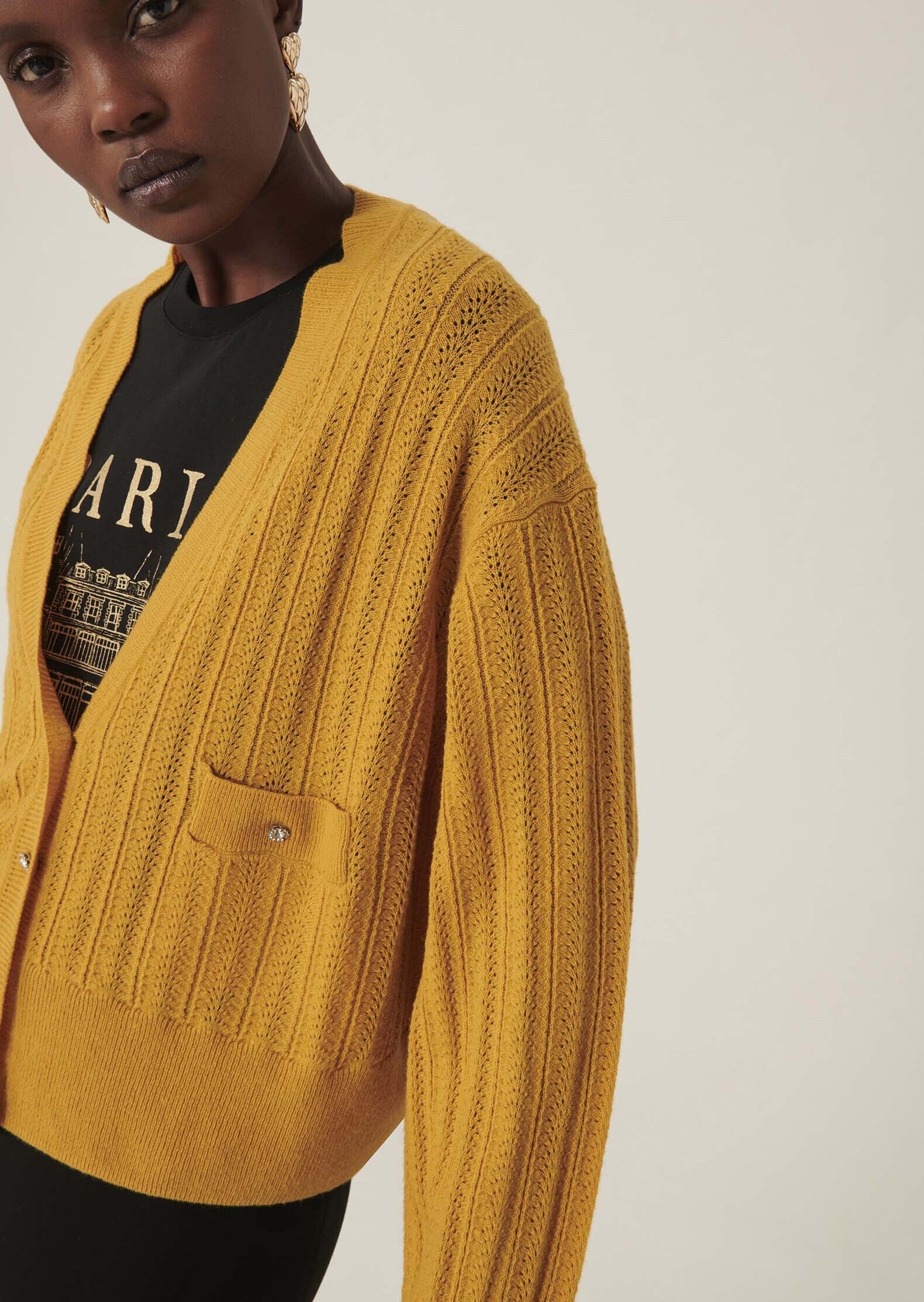 Gilet Giorgia jaune en maille identitaire Faume - seconde main