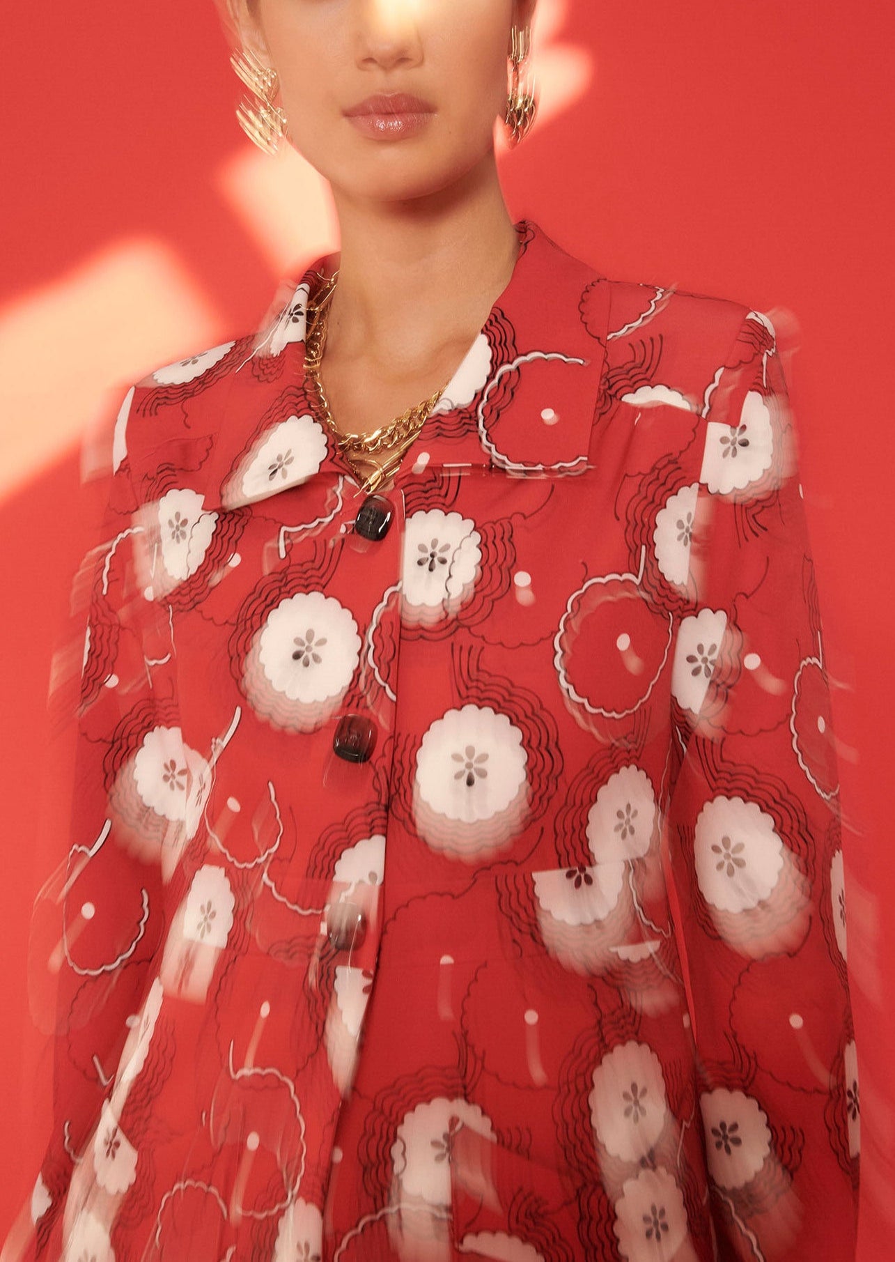 Veste Voguer rouge imprimé fleurs 70's Faume - seconde main