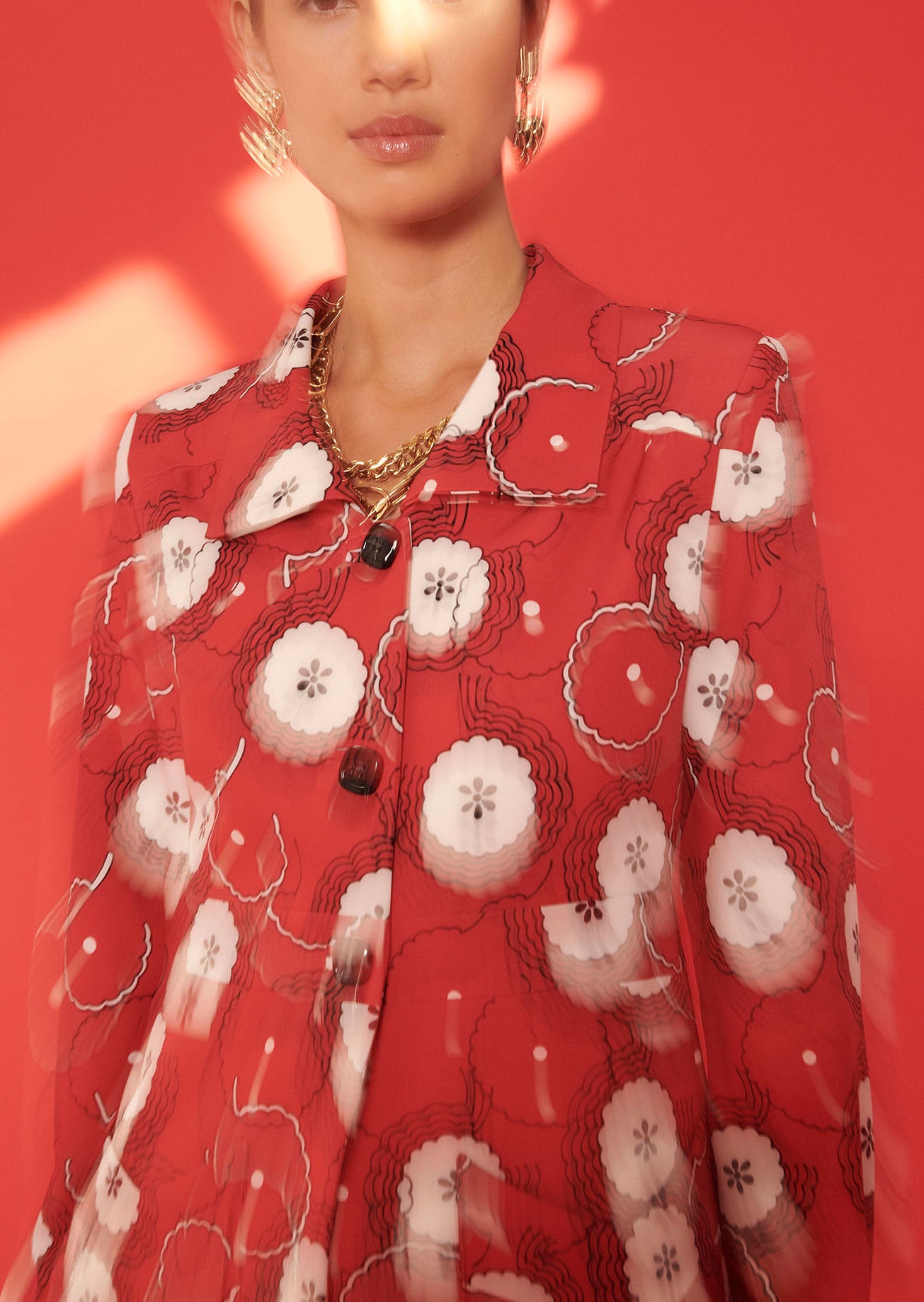 Veste Voguer rouge imprimé fleurs 70's Faume - seconde main