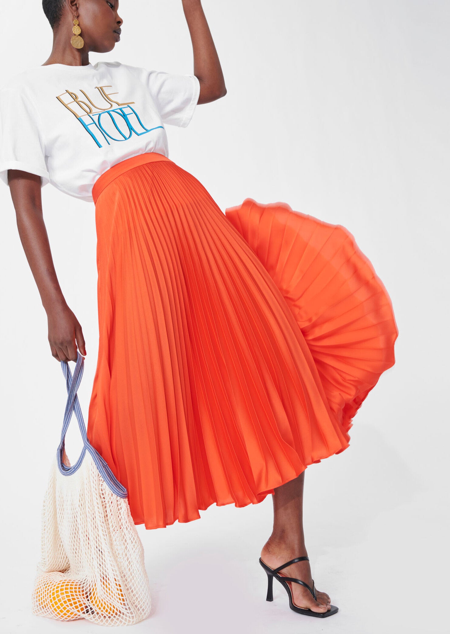 Jupe Juline orange en satin plissé Faume - seconde main