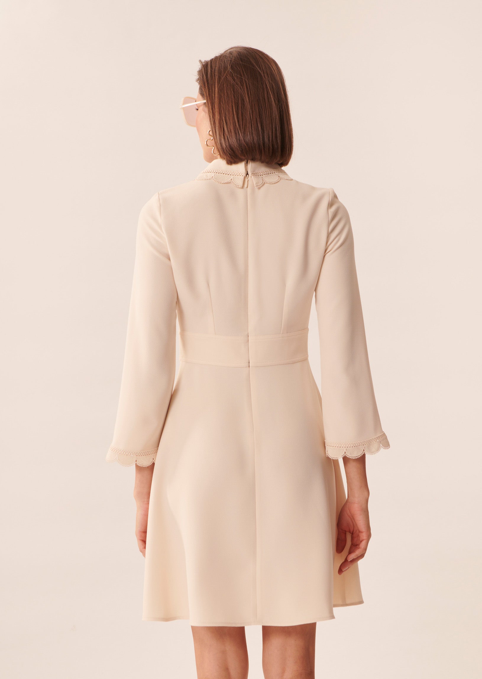 Robe Ric écrue en crêpe Faume - seconde main